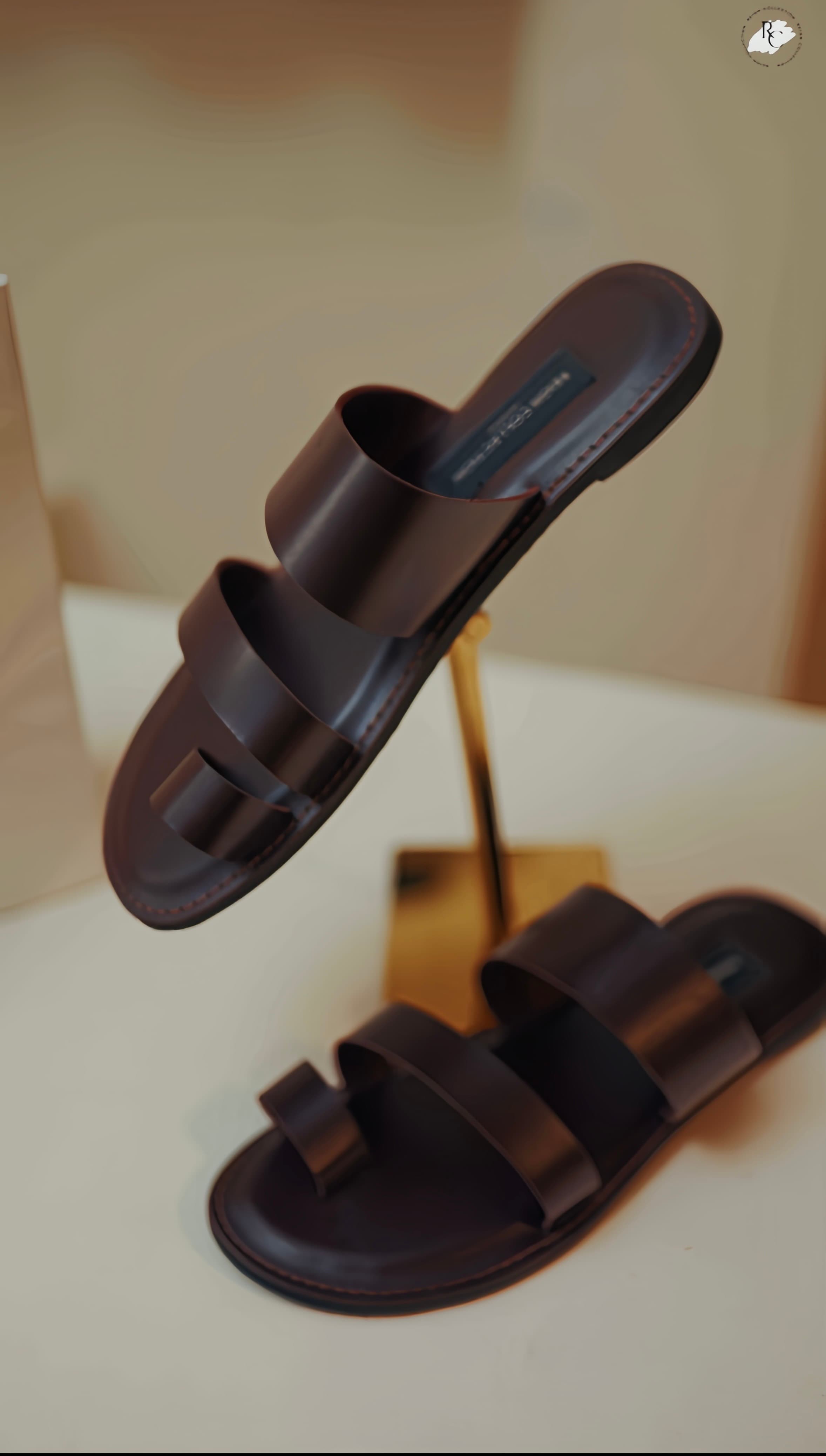 Leather slides in the Reign Collection atelier